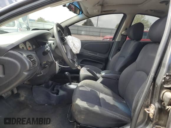2003 Dodge Neon SXT with VIN 1B3ES56C13D201127, listed as a Copart auction lot 55269195 with 184,690 mi miles and Salvage title. Bid and sale history available at DreamBid. Image 7.