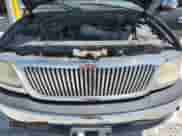 2002 Ford F-150 XLT с VIN 1FTRW07L22KB04146, выставлен на аукционе Copart как лот 69320515 с пробегом 189 839 миль миль и Списание • Salvage title. История ставок и продаж доступна на DreamBid. Изображение 11.