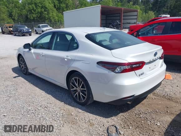 2021 Toyota Camry Hybrid XLE with VIN 4T1F31AKXMU556673, listed as a IAAI auction lot 42018439 with 56,429 mi miles and . Bid and sale history available at DreamBid. Image 3.
