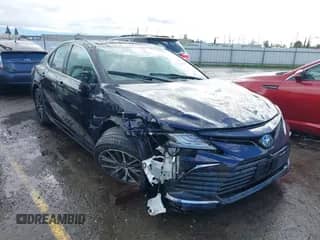 2021 Toyota Camry Hybrid XLE with VIN 4T1F31AK0MU553345, listed as a IAAI auction lot 41561753 with 35,986 mi miles and . Bid and sale history available at DreamBid. Image 1.