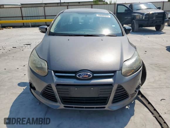 2014 Ford Focus Titanium with VIN 1FADP3J26EL149118, listed as a Copart auction lot 70688925 with 94,831 mi miles and Salvage title. Bid and sale history available at DreamBid. Image 5.
