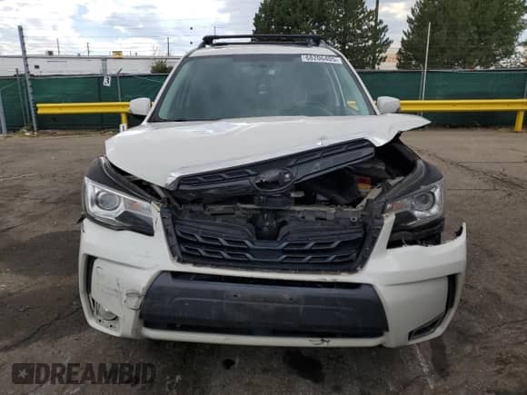 2017 Subaru Forester Touring z VIN JF2SJGTC9HH412677, wystawiony jako Copart lot #68206405 z przebiegiem 130 892 mil mil oraz Szkoda całkowita • Salvage title. Historia ofert i sprzedaży dostępna na DreamBid. Obrazek 5.