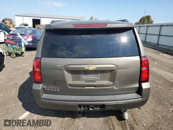 2015 Chevrolet Tahoe LS с VIN 1GNSKAKC2FR698381, выставлен на аукционе Copart как лот 80243835 с пробегом 136 047 миль миль и Чистый • Clean title. История ставок и продаж доступна на DreamBid. Изображение 6.