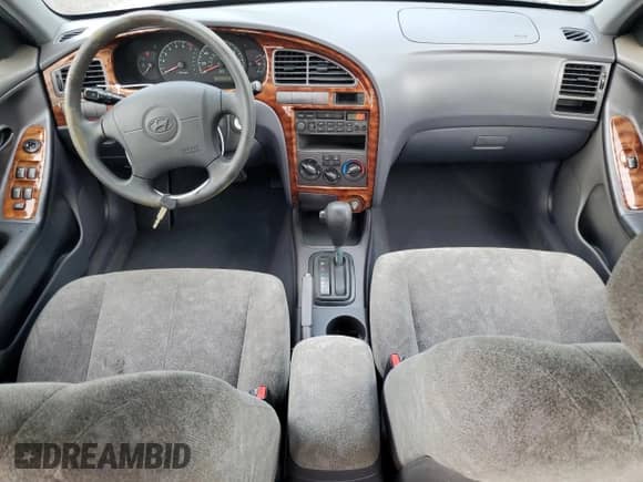 2003 Hyundai Elantra GLS с VIN KMHDN45DX3U677149, выставлен на аукционе Copart как лот 70458175 с пробегом 26 652 миль миль и Списание • Salvage title. История ставок и продаж доступна на DreamBid. Изображение 8.