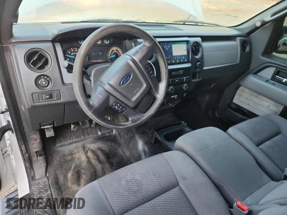 2014 Ford F-150 XL with VIN 1FTEX1CM7EKG36822, listed as a Copart auction lot 82197335 with 184,300 mi miles and Salvage title. Bid and sale history available at DreamBid. Image 8.