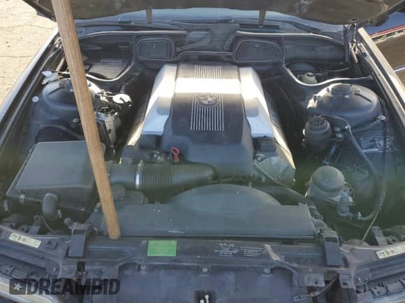 1999 BMW 7 Series 740iL with VIN WBAGH833XXDP05481, listed as a Copart auction lot 85510534 with 159,680 mi miles and Salvage title. Bid and sale history available at DreamBid. Image 12.