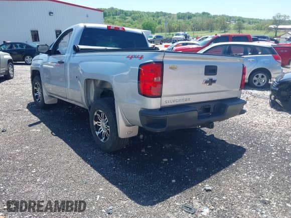 2014 Chevrolet Silverado 1500 Work Truck with VIN 1GCNKPEC8EZ277428, listed as a IAAI auction lot 42038595 with 132,179 mi miles and . Bid and sale history available at DreamBid. Image 3.