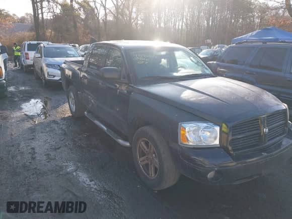 2007 Dodge Dakota SLT with VIN 1D7HW48N47S269812, listed as a IAAI auction lot 41496814 with 160,807 mi miles and . Bid and sale history available at DreamBid. Image 1.
