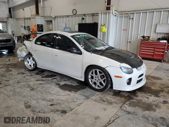 2004 Dodge Neon SRT-4 with VIN 1B3ES66S14D569869, listed as a Copart auction lot 64377965 with 167,521 mi miles and Non repairable. Bid and sale history available at DreamBid. Image 4.
