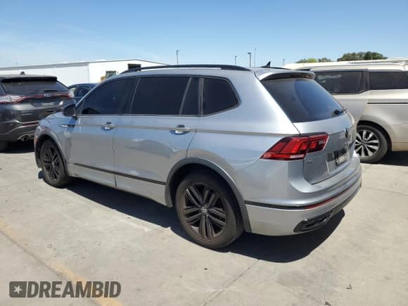 2022 Volkswagen Tiguan SE R-Line Black с VIN 3VVCB7AX8NM059816, выставлен на аукционе Copart как лот 67644345 с пробегом 69 898 миль миль и Списание • Salvage title. История ставок и продаж доступна на DreamBid. Изображение 2.