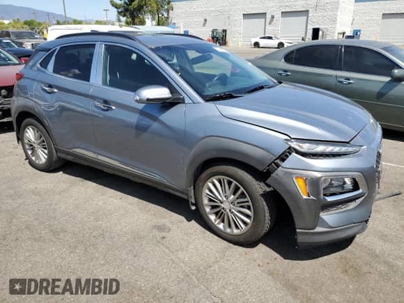 2018 Hyundai Kona SEL с VIN KM8K22AA6JU186073, выставлен на аукционе Copart как лот 70691595 с пробегом 69 244 миль миль и Списание • Salvage title. История ставок и продаж доступна на DreamBid. Изображение 4.