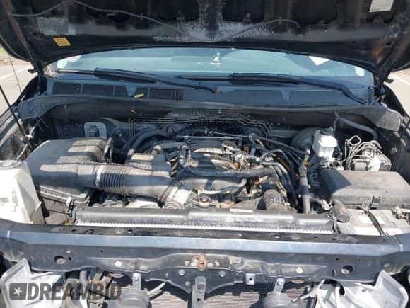 2012 Toyota Tundra z VIN 5TFRY5F10CX117652, wystawiony jako IAAI lot #42617080 z przebiegiem 233 560 mil mil oraz . Historia ofert i sprzedaży dostępna na DreamBid. Obrazek 10.