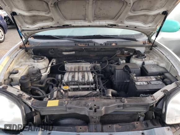 2004 Hyundai Santa Fe GLS with VIN KM8SC73D24U850410, listed as a Copart auction lot 78147144 with 181,995 mi miles and Salvage title. Bid and sale history available at DreamBid. Image 12.