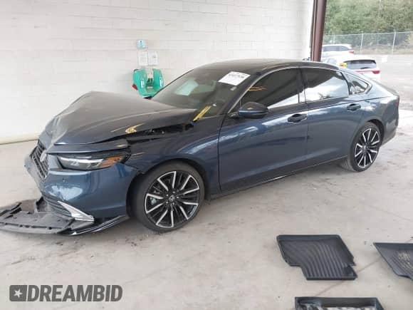 2024 Honda Accord Touring with VIN 1HGCY2F89RA014082, listed as a IAAI auction lot 43417538 with 50,494 mi miles and . Bid and sale history available at DreamBid. Image 2.