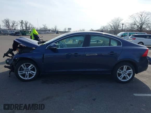 2015 Volvo S60 T5 Drive-E Premier with VIN YV126MFK1F2336609, listed as a IAAI auction lot 41786376 with 50,538 mi miles and . Bid and sale history available at DreamBid. Image 14.