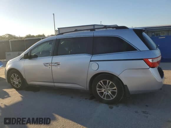 2013 Honda Odyssey EX-L z VIN 5FNRL5H63DB042917, wystawiony jako Copart lot #86450745 z przebiegiem 223 098 mil mil oraz Szkoda całkowita • Salvage title. Historia ofert i sprzedaży dostępna na DreamBid. Obrazek 2.