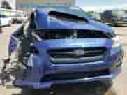 2017 Subaru WRX Premium with VIN JF1VA1F63H9815259, listed as a Copart auction lot 60744615 with 129,075 mi miles and Salvage title. Bid and sale history available at DreamBid. Image 5.