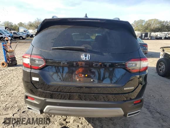 2023 Honda Pilot Touring с VIN 5FNYG2H77PB006594, выставлен на аукционе Copart как лот 83662854 с пробегом 37 637 миль миль и Списание • Salvage title. История ставок и продаж доступна на DreamBid. Изображение 6.