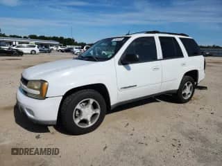 2004 Chevrolet TrailBlazer LS с VIN 1GNDS13S142145158, выставлен на аукционе Copart как лот 70478395 с пробегом 169 554 миль миль и Списание • Salvage title. История ставок и продаж доступна на DreamBid. Изображение 1.