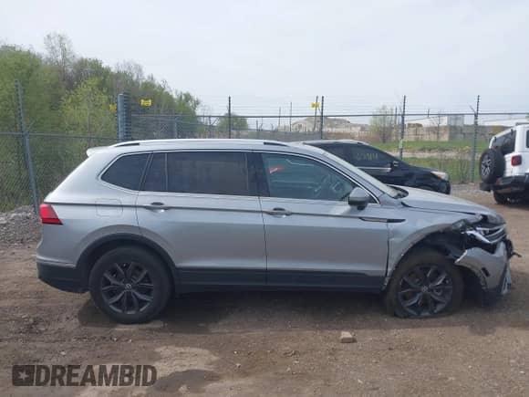 2023 Volkswagen Tiguan SE with VIN 3VVMB7AX6PM130146, listed as a IAAI auction lot 42134404 with 24,803 mi miles and . Bid and sale history available at DreamBid. Image 13.