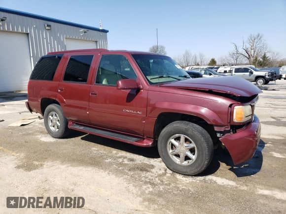 2000 Cadillac Escalade z VIN 1GYEK13R1YR123601, wystawiony jako Copart lot #48589225 z przebiegiem 258 998 mil mil oraz Szkoda całkowita • Salvage title. Historia ofert i sprzedaży dostępna na DreamBid. Obrazek 4.