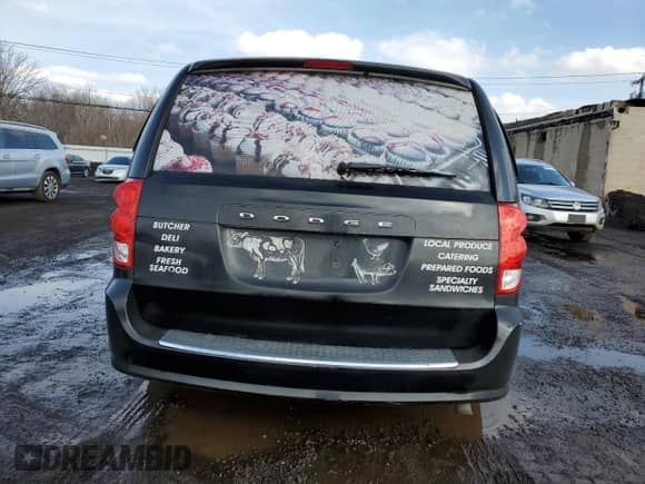 2011 Dodge Caravan with VIN 2D4JN1AGXBR618624, listed as a Copart auction lot 46597005 with 110,677 mi miles and Clean title. Bid and sale history available at DreamBid. Image 6.