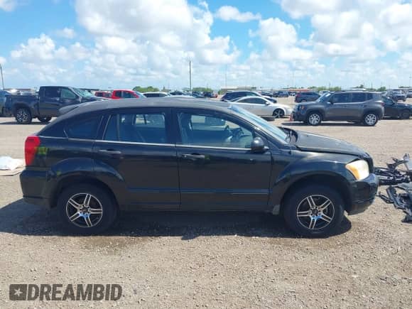 2008 Dodge Caliber SE with VIN 1B3HB28B38D634861, listed as a IAAI auction lot 42569234 with 159,849 mi miles and . Bid and sale history available at DreamBid. Image 13.