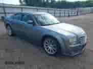 2006 Chrysler 300 C SRT-8 with VIN 2C3LA73W66H523504, listed as a IAAI auction lot 42483103 with 61,560 mi miles and . Bid and sale history available at DreamBid. Image 1.