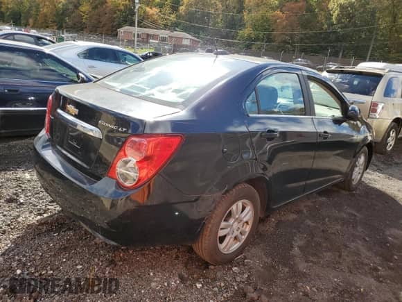 2016 Chevrolet Sonic LT с VIN 1G1JC5SG7G4107576, выставлен на аукционе Copart как лот 87112175 с пробегом 131 972 миль миль и Списание • Salvage title. История ставок и продаж доступна на DreamBid. Изображение 3.
