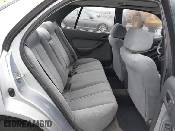 1994 Toyota Camry LE z VIN JT2SK12E2R0207688, wystawiony jako IAAI lot #41323827 z przebiegiem 162 680 mil mil oraz . Historia ofert i sprzedaży dostępna na DreamBid. Obrazek 8.