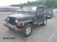 2001 Jeep Wrangler Sahara with VIN 1J4FA59S41P376079, listed as a IAAI auction lot 42739280 with 255,999 mi miles and . Bid and sale history available at DreamBid. Image 2.