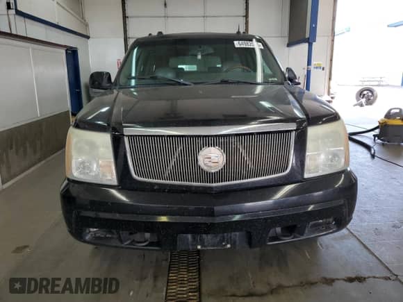 2004 Cadillac Escalade ESV z VIN 3GYFK66N04G233866, wystawiony jako Copart lot #64982075 z przebiegiem 204 562 mil mil oraz Czysty tytuł • Clean title. Historia ofert i sprzedaży dostępna na DreamBid. Obrazek 5.
