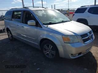 2009 Dodge Grand Caravan SXT with VIN 2D8HN54X19R529762, listed as a IAAI auction lot 43323273 with 166,311 mi miles and . Bid and sale history available at DreamBid. Image 1.