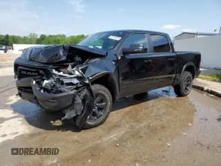 2024 Ram 1500 Rebel with VIN 1C6SRFLT8RN131904, listed as a Copart auction lot 56740655 with 32,833 mi miles and Salvage title. Bid and sale history available at DreamBid. Image 1.