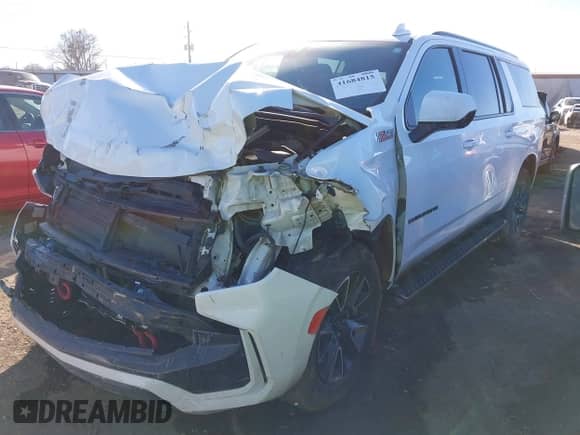2022 Chevrolet Suburban Z71 z VIN 1GNSKDKD6NR150067, wystawiony jako IAAI lot #41684815 z przebiegiem 73 416 mil mil oraz . Historia ofert i sprzedaży dostępna na DreamBid. Obrazek 2.