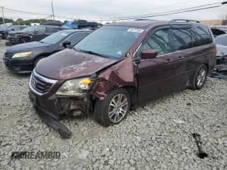 2009 Honda Odyssey Touring with VIN 5FNRL38939B014797, listed as a Copart auction lot 80172985 with 220,493 mi miles and Salvage title. Bid and sale history available at DreamBid. Image 1.