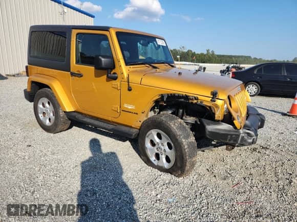 2014 Jeep Wrangler Sahara с VIN 1C4AJWBG1EL266289, выставлен на аукционе Copart как лот 81712295 с пробегом 128 403 миль миль и Списание • Salvage title. История ставок и продаж доступна на DreamBid. Изображение 4.