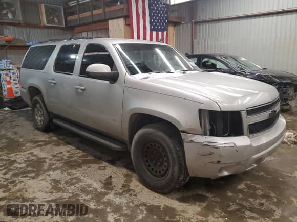 2011 Chevrolet Suburban LS with VIN 1GNSKHE38BR376102, listed as a Copart auction lot 87832845 with 167,664 mi miles and Salvage title. Bid and sale history available at DreamBid. Image 4.