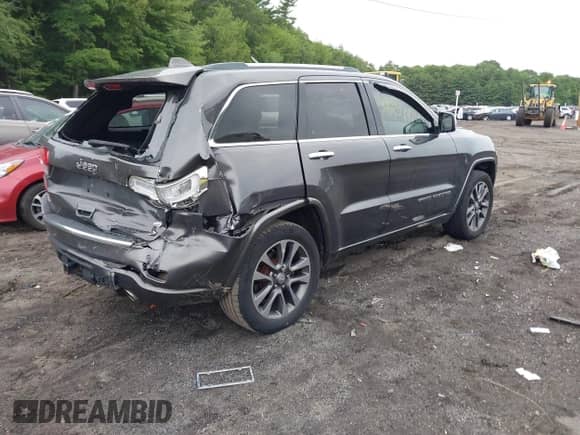 2017 Jeep Grand Cherokee Overland with VIN 1C4RJFCG0HC818791, listed as a IAAI auction lot 42574718 with 119,455 mi miles and . Bid and sale history available at DreamBid. Image 4.