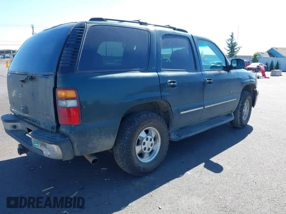2002 Chevrolet Tahoe LT with VIN 1GNEK13Z02J163297, listed as a IAAI auction lot 43281684 with 273,034 mi miles and . Bid and sale history available at DreamBid. Image 4.