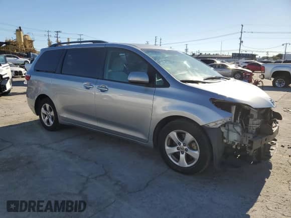 2017 Toyota Sienna LE with VIN 5TDKZ3DC2HS801090, listed as a Copart auction lot 85857305 with 401,170 mi miles and Salvage title. Bid and sale history available at DreamBid. Image 4.