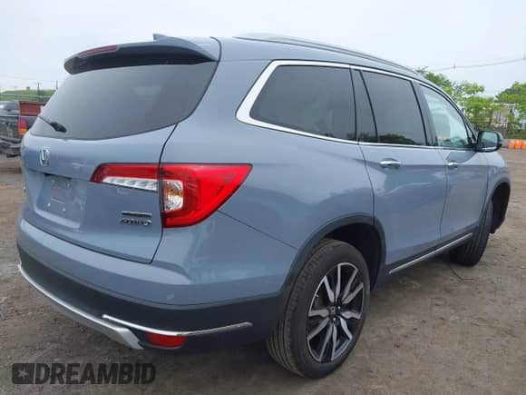 2022 Honda Pilot Touring 7-Passenger z VIN 5FNYF6H68NB056077, wystawiony jako IAAI lot #42357338 z przebiegiem 18 193 mil mil oraz . Historia ofert i sprzedaży dostępna na DreamBid. Obrazek 4.