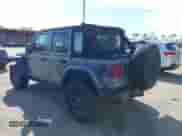 2023 Jeep Wrangler Rubicon with VIN 1C4JJXR67PW704365, listed as a IAAI auction lot 41335211 with 21,725 mi miles and . Bid and sale history available at DreamBid. Image 3.