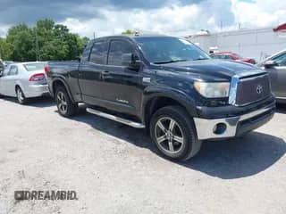 2012 Toyota Tundra z VIN 5TFRY5F17CX128888, wystawiony jako IAAI lot #42508395 z przebiegiem 279 524 mil mil oraz . Historia ofert i sprzedaży dostępna na DreamBid. Obrazek 1.