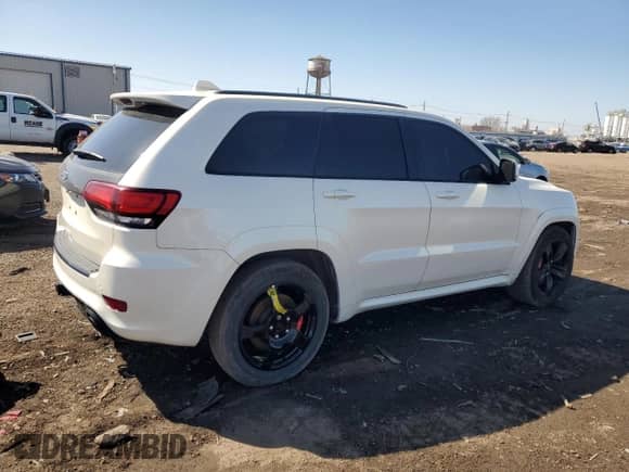 2016 Jeep Grand Cherokee SRT z VIN 1C4RJFDJ2GC441079, wystawiony jako Copart lot #48360525 z przebiegiem 61 152 mil mil oraz Szkoda całkowita • Salvage title. Historia ofert i sprzedaży dostępna na DreamBid. Obrazek 3.