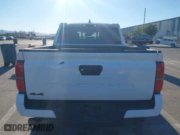 2024 Toyota Tacoma SR5 with VIN 3TMLB5JN8RM034034, listed as a IAAI auction lot 41253779 with 21,448 mi miles and . Bid and sale history available at DreamBid. Image 16.