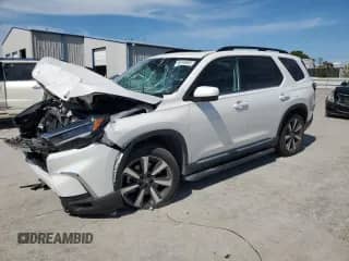 2023 Honda Pilot Touring с VIN 5FNYG1H70PB051550, выставлен на аукционе Copart как лот 56148085 с пробегом 19 785 миль миль и Списание • Salvage title. История ставок и продаж доступна на DreamBid. Изображение 1.