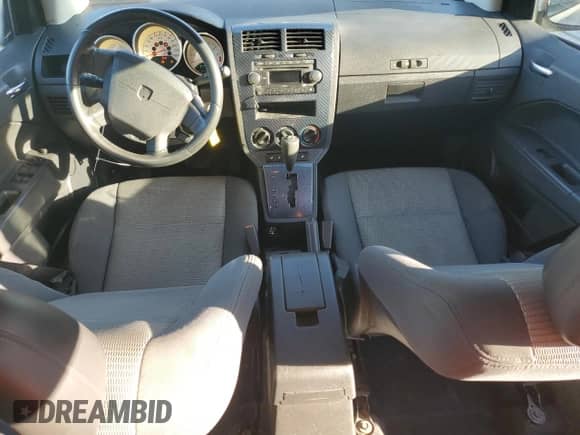 2008 Dodge Caliber R/T with VIN 1B3HB78K28D658677, listed as a Copart auction lot 87190735 with 197,297 mi miles and Salvage title. Bid and sale history available at DreamBid. Image 8.