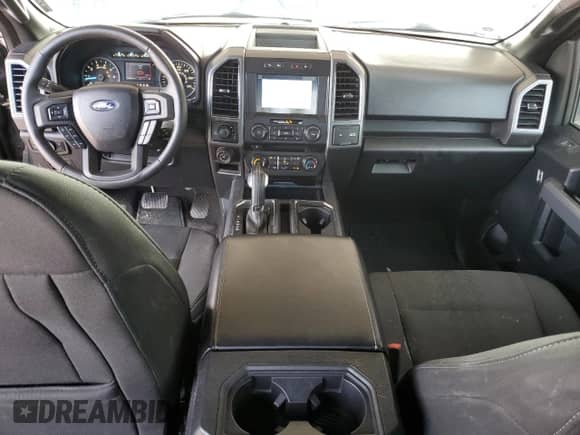 2018 Ford F-150 XLT z VIN 1FTEW1EG1JKE39990, wystawiony jako Copart lot #81076395 z przebiegiem 23 988 mil mil oraz Szkoda całkowita • Salvage title. Historia ofert i sprzedaży dostępna na DreamBid. Obrazek 8.