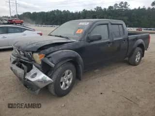 2009 Nissan Frontier SE with VIN 1N6AD09W99C404567, listed as a Copart auction lot 73174434 with Not provided miles and Salvage title. Bid and sale history available at DreamBid. Image 1.